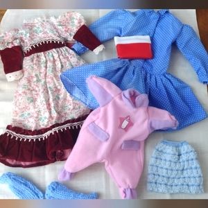 Lot of doll clothes.  Should fit a medium size doll.